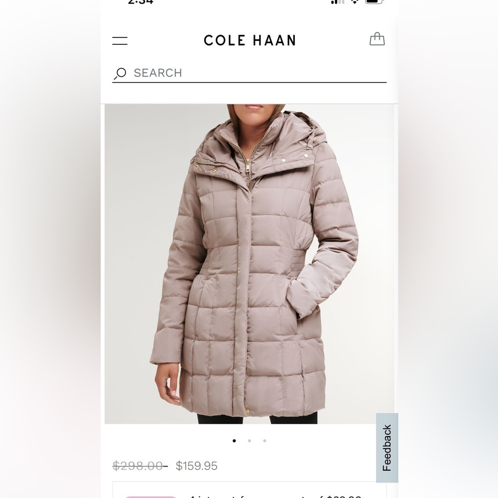 New with tags Cole Haan puffer coat.